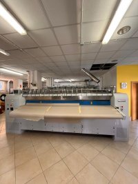 NOUVELLE INSTALLATION D’UNE LIGNE DE REPASSAGE AVEC CALANDRE D1200X3300G ET PLIEUSE FOLTEX LP330